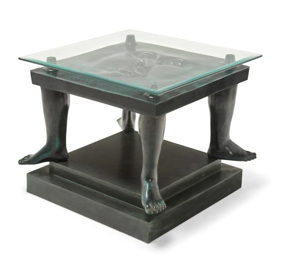 Small Table with Face de Sergio Bustamante - Patinated cast bronze with glass top on painted wood plinth, 1996